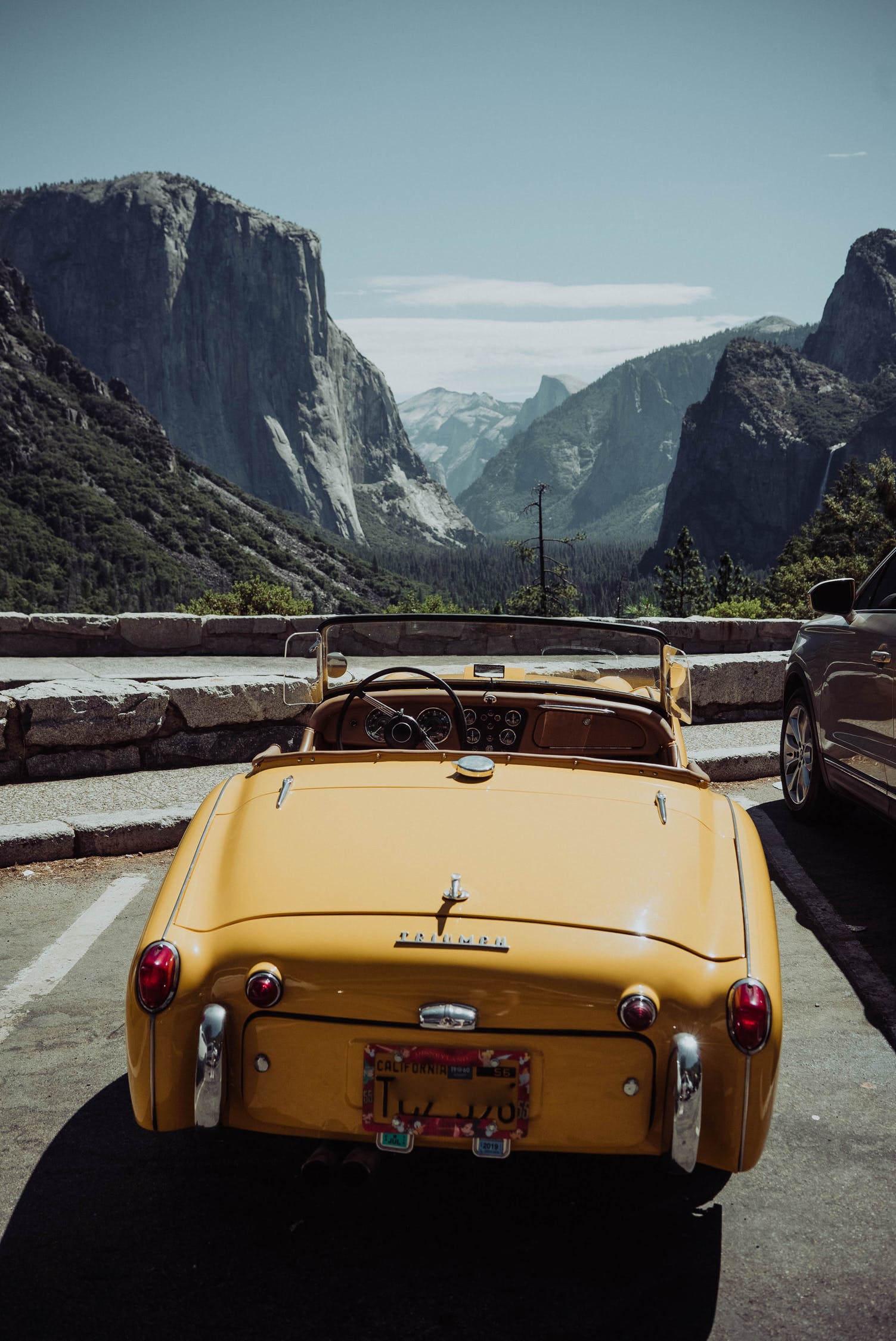 car out of state looking over cliff