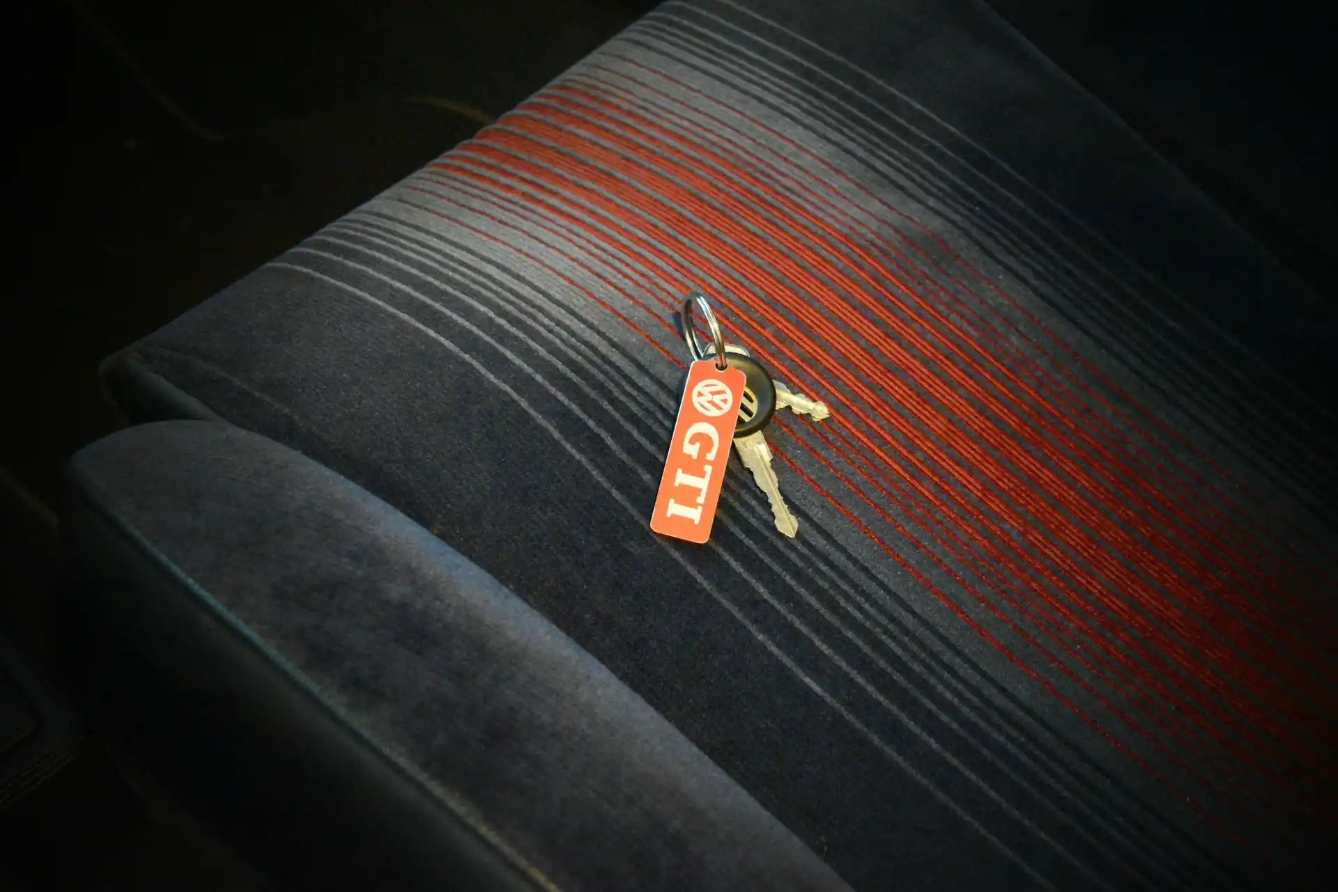 man holding car keys